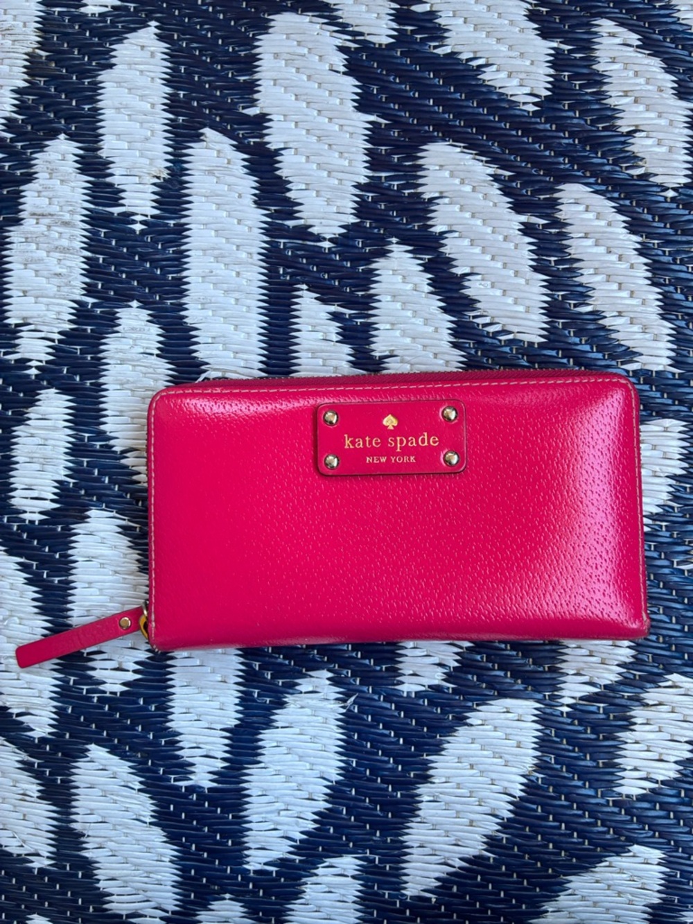 kate spade bright fuchsia zip-around wallet with gold-tone plaque